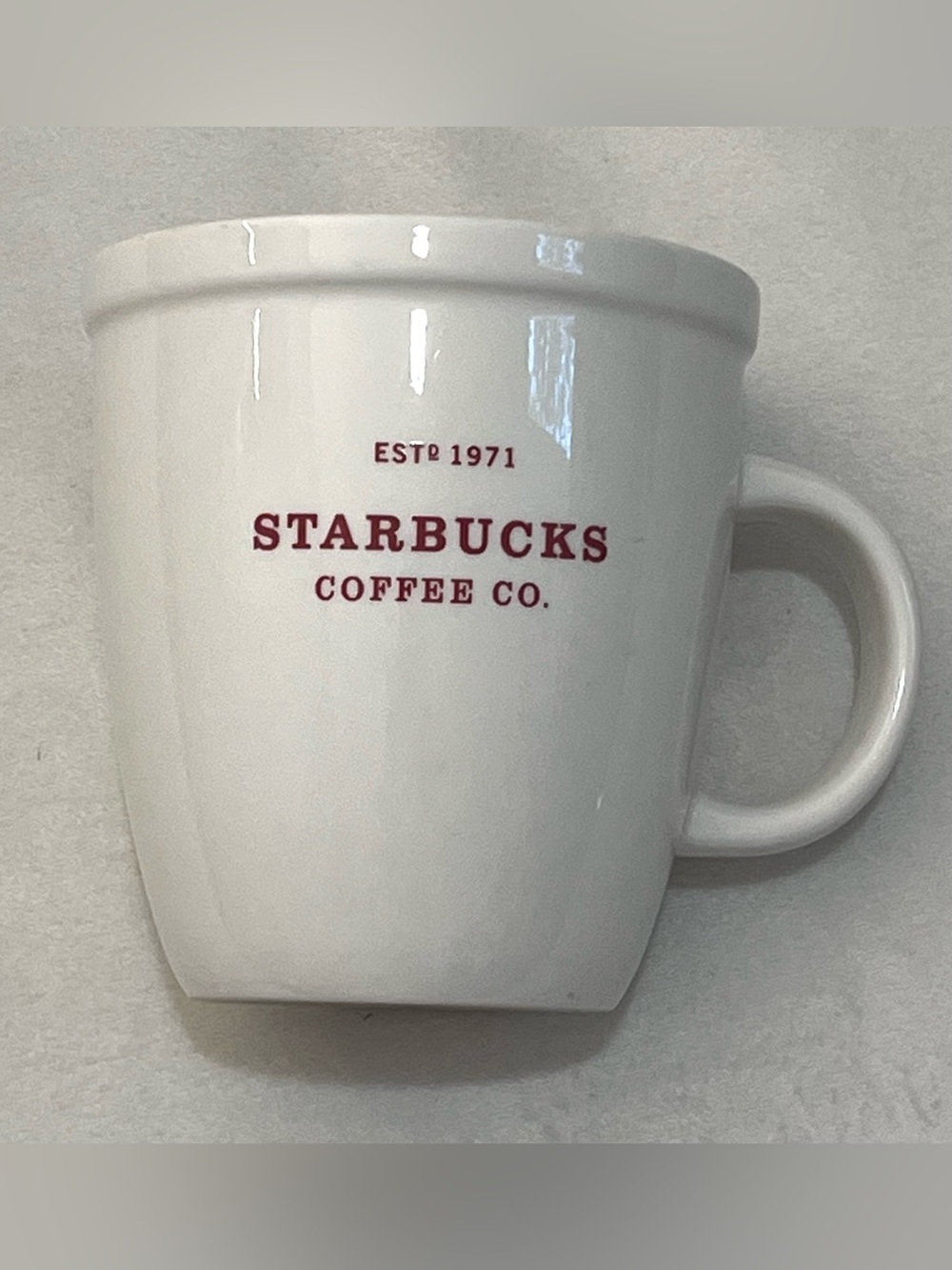Starbucks Coffee Co 2007 Holiday Abbey White Ceramic Mug with Red Logo Est 1971